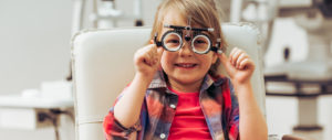 happpy child during asheville eye eye examine
